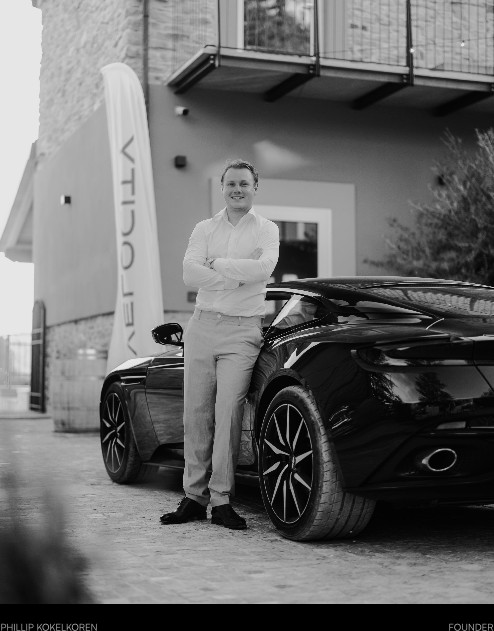 Phillip Kokelkoren, founder of Velocity, with an Aston Martin